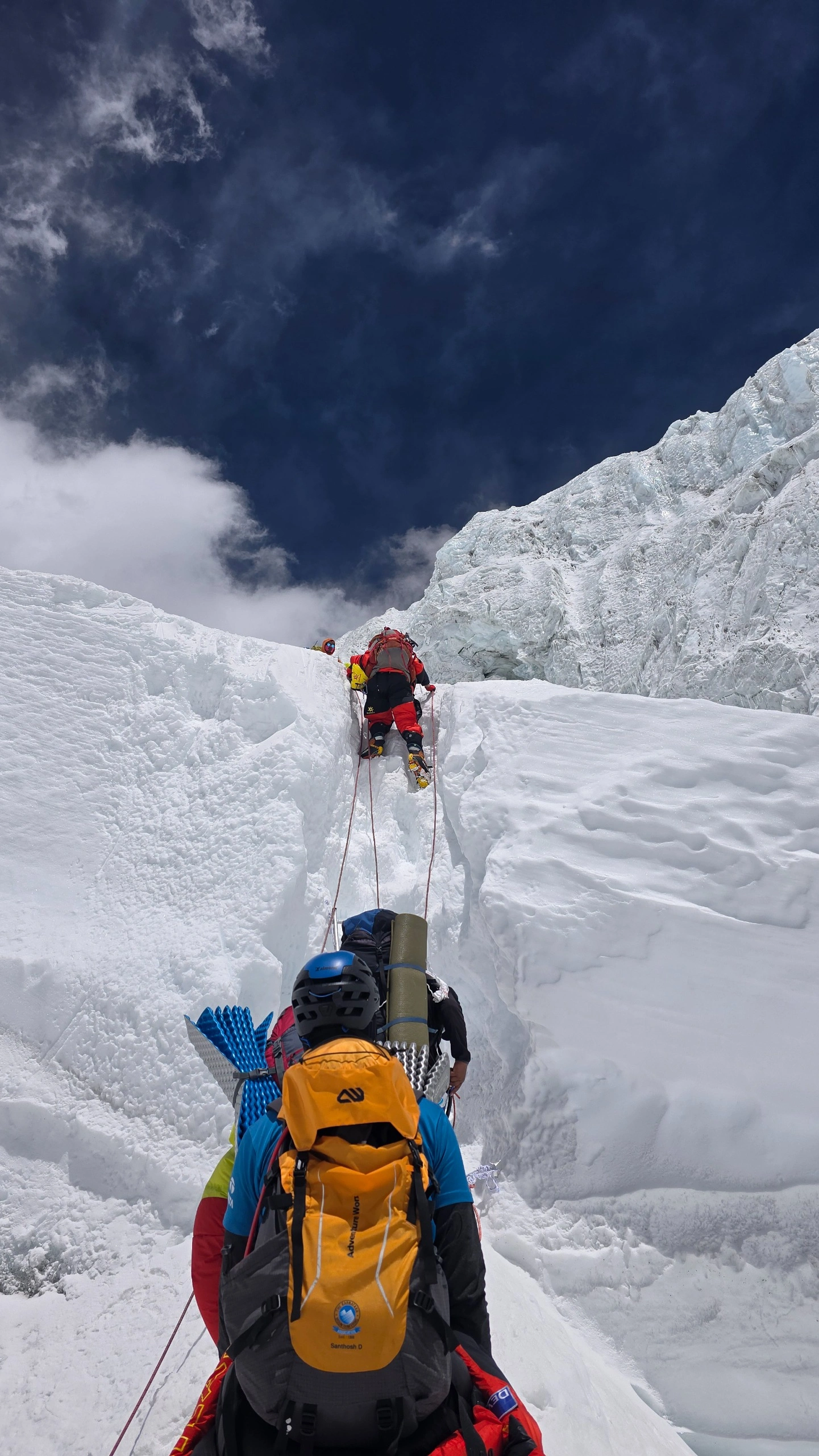 Mountaineer using the Adventure Worx Everest expedition backpack during technical ice climbing